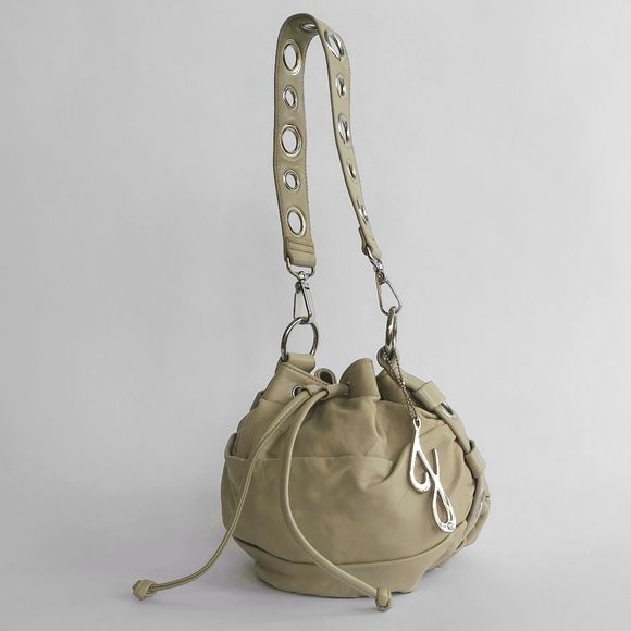 JLO by Jennifer Lopez Pleated Leather with silver Grommet Bucket Bag - Picture 2 of 12